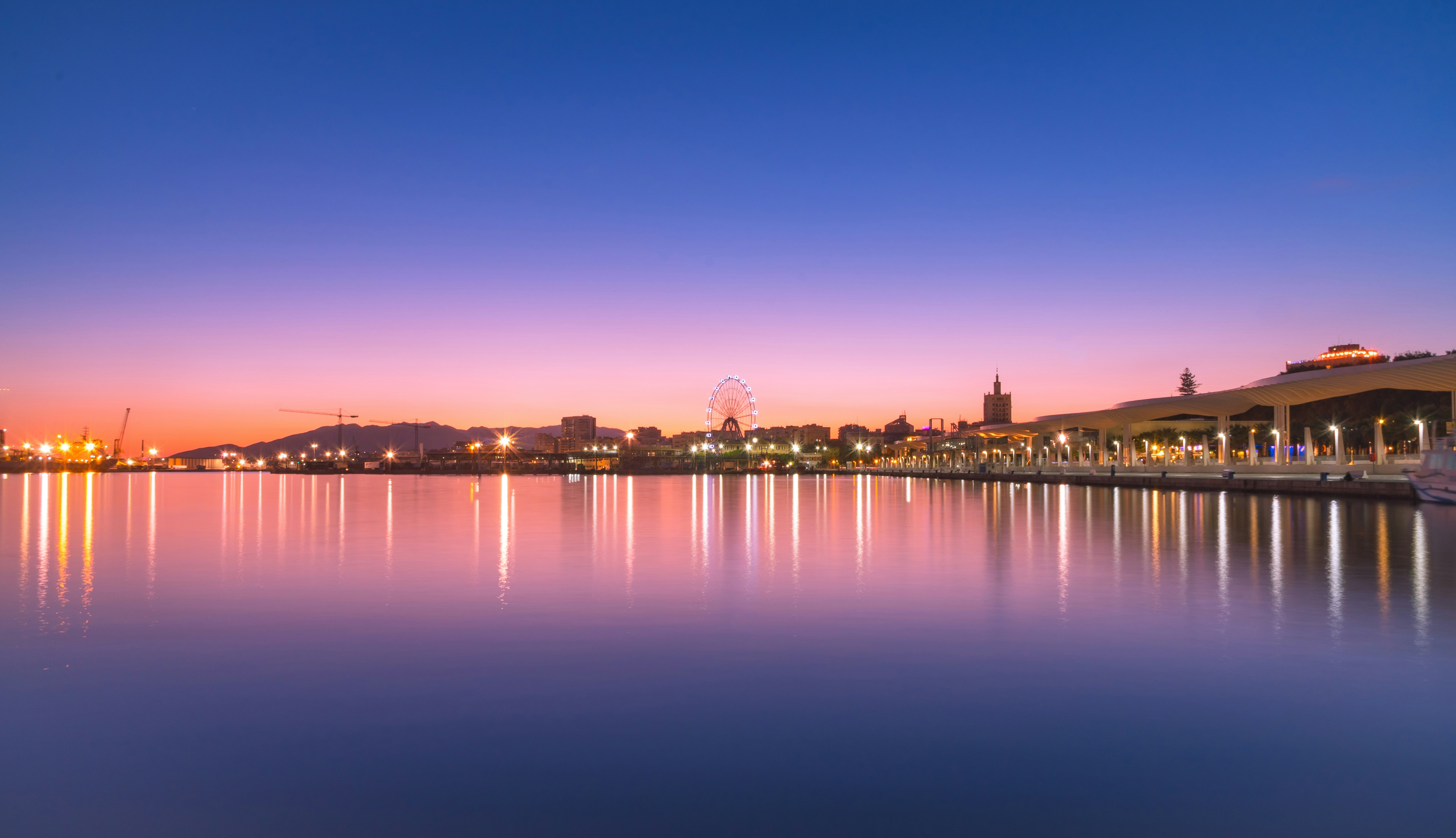 calm body of water during golden hour